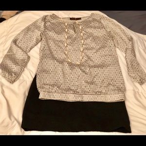 A whole outfit, top and mini skirt